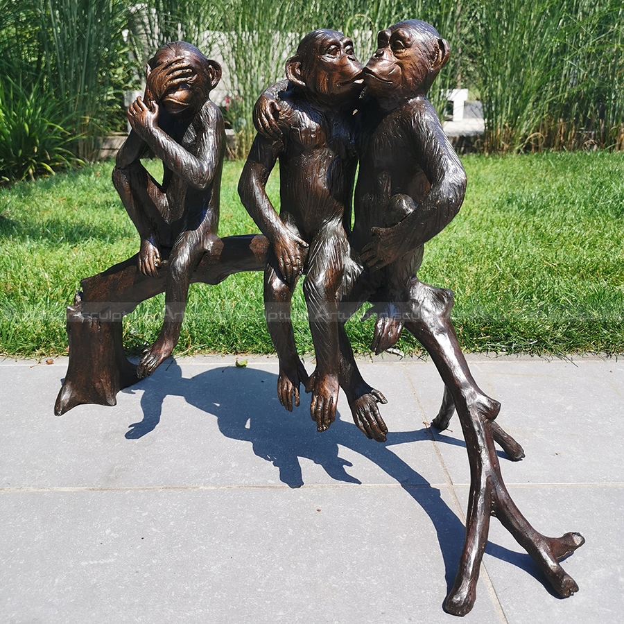 three monkeys sculpture