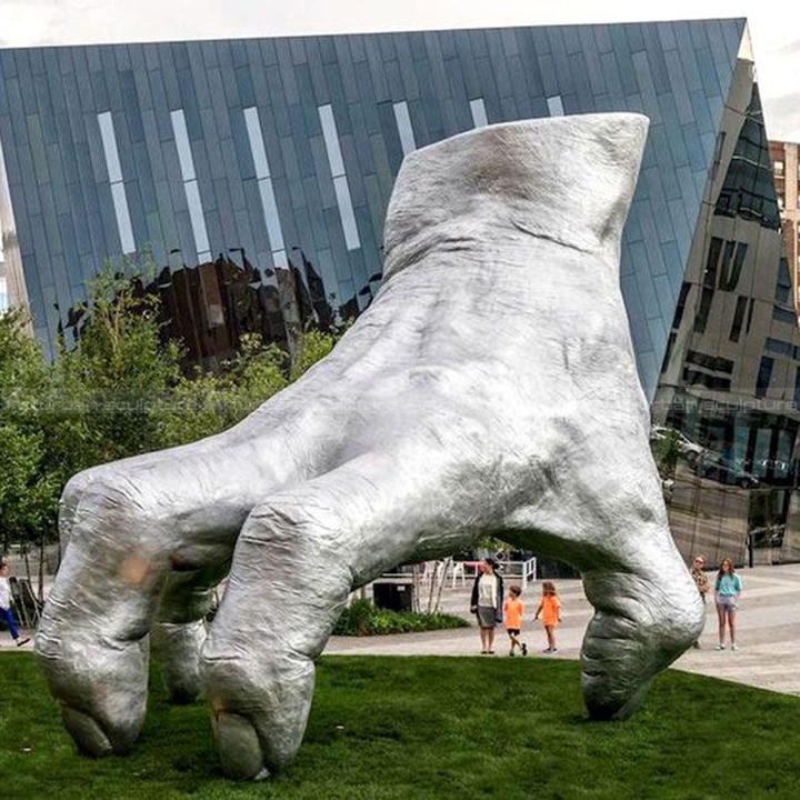 silver hand sculpture