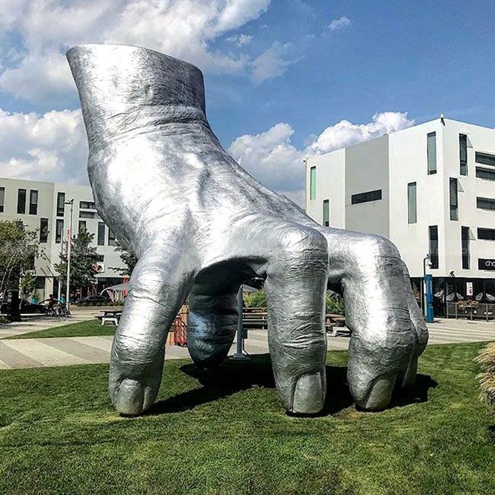 silver hand sculpture