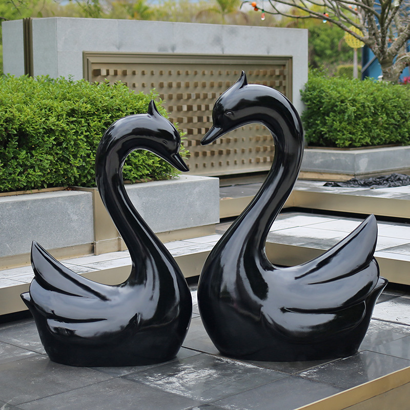 swan couple statue