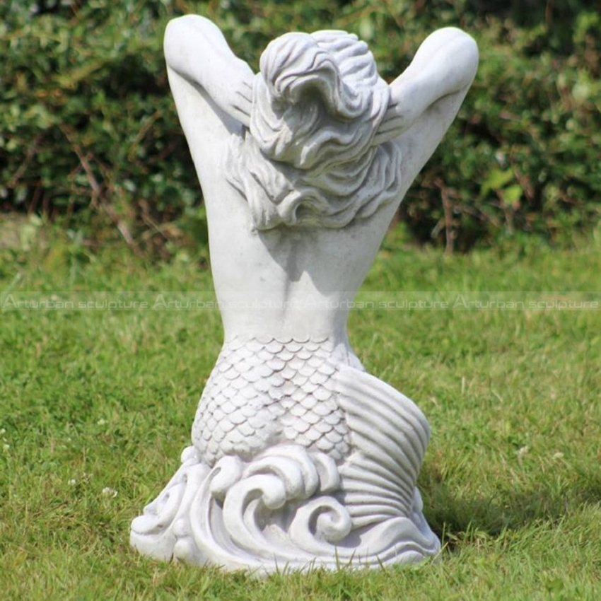 stone mermaid statue