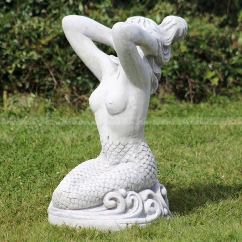 stone mermaid statue