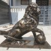 lion statues in front of house