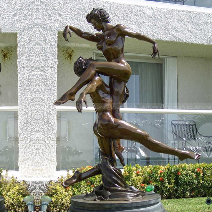 dancing couple statue