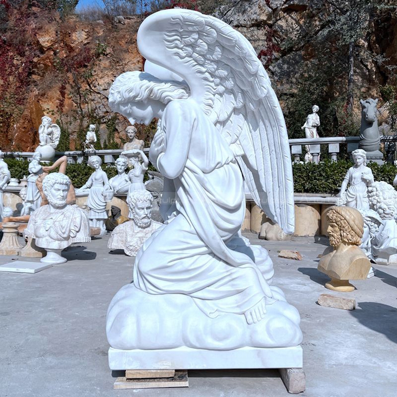 kneeling angel figurine