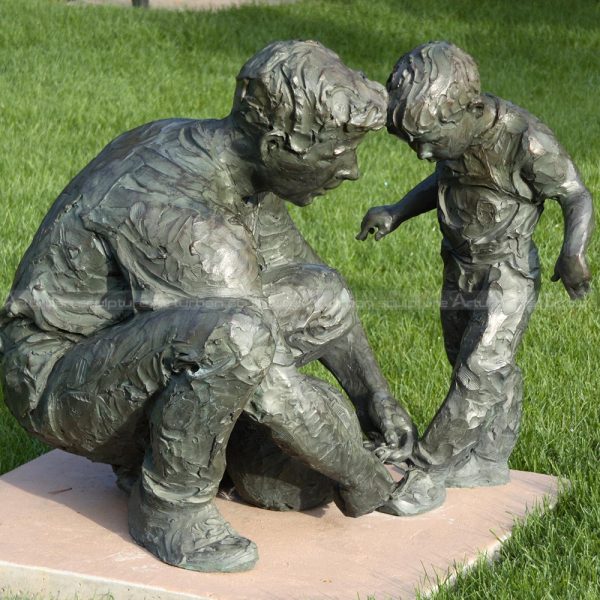 father and child sculpture