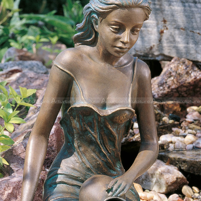 girl holding pot water fountain