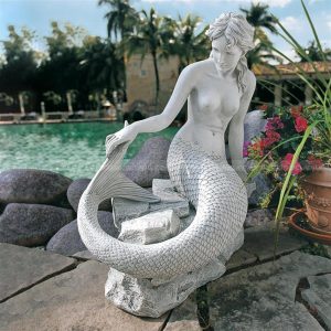 large outdoor mermaid statues
