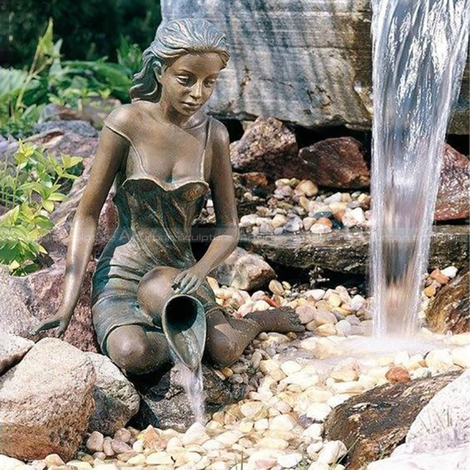 girl holding pot water fountain