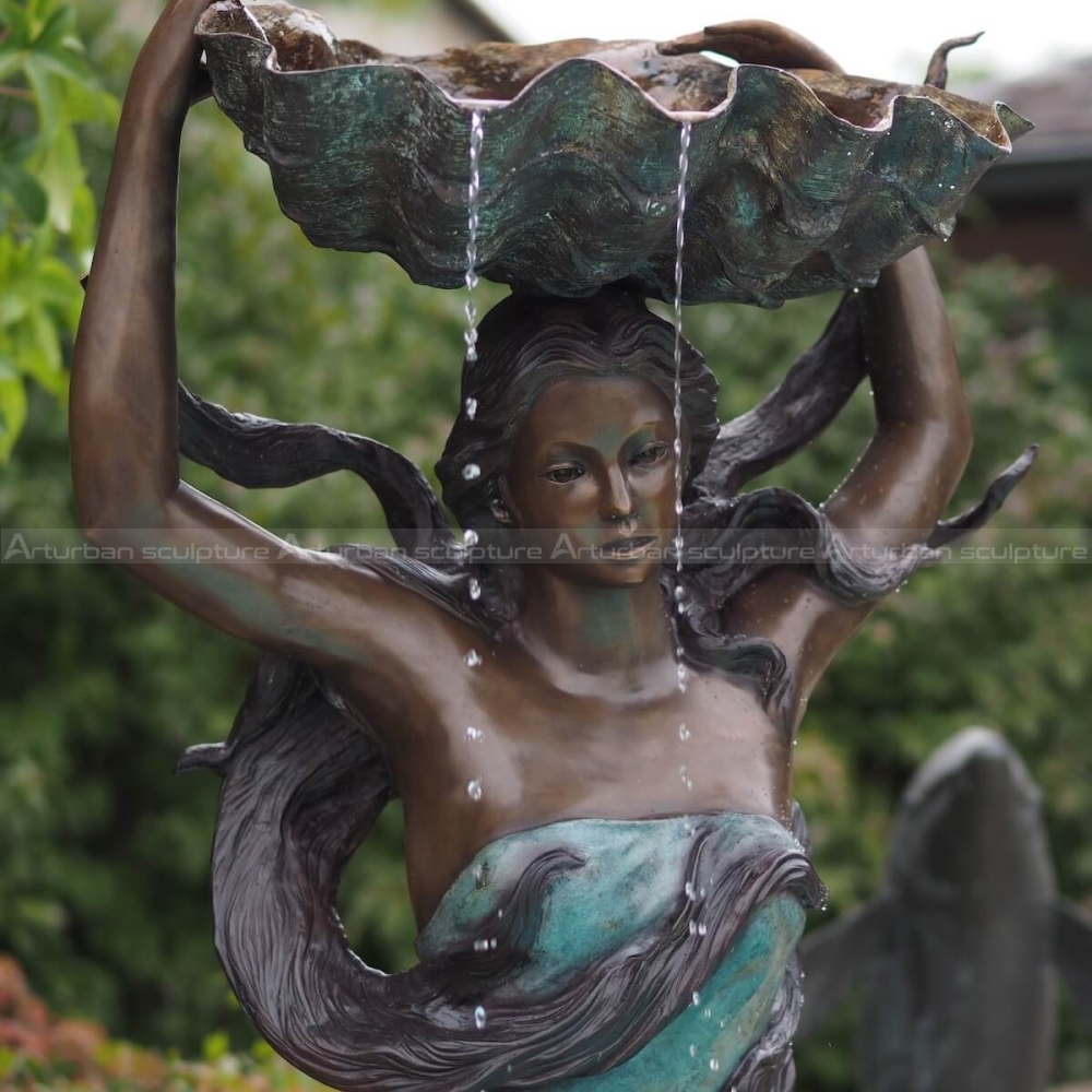 lady statue water fountain