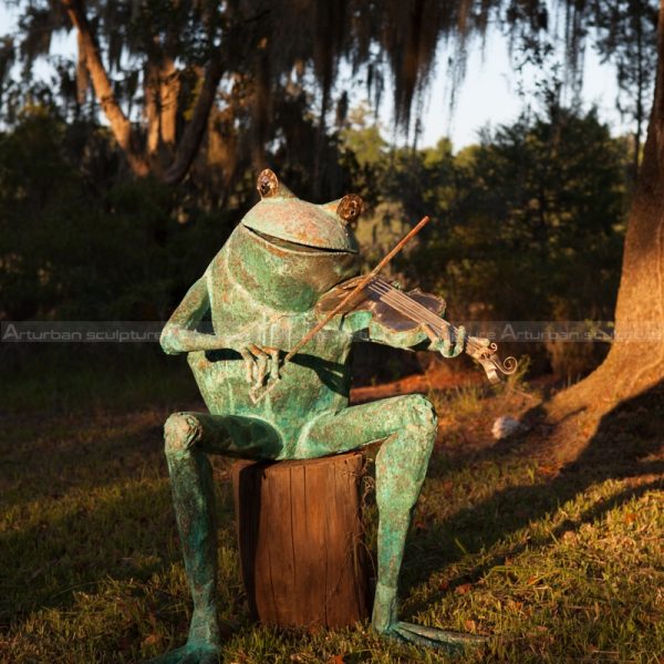 frog playing violin statue