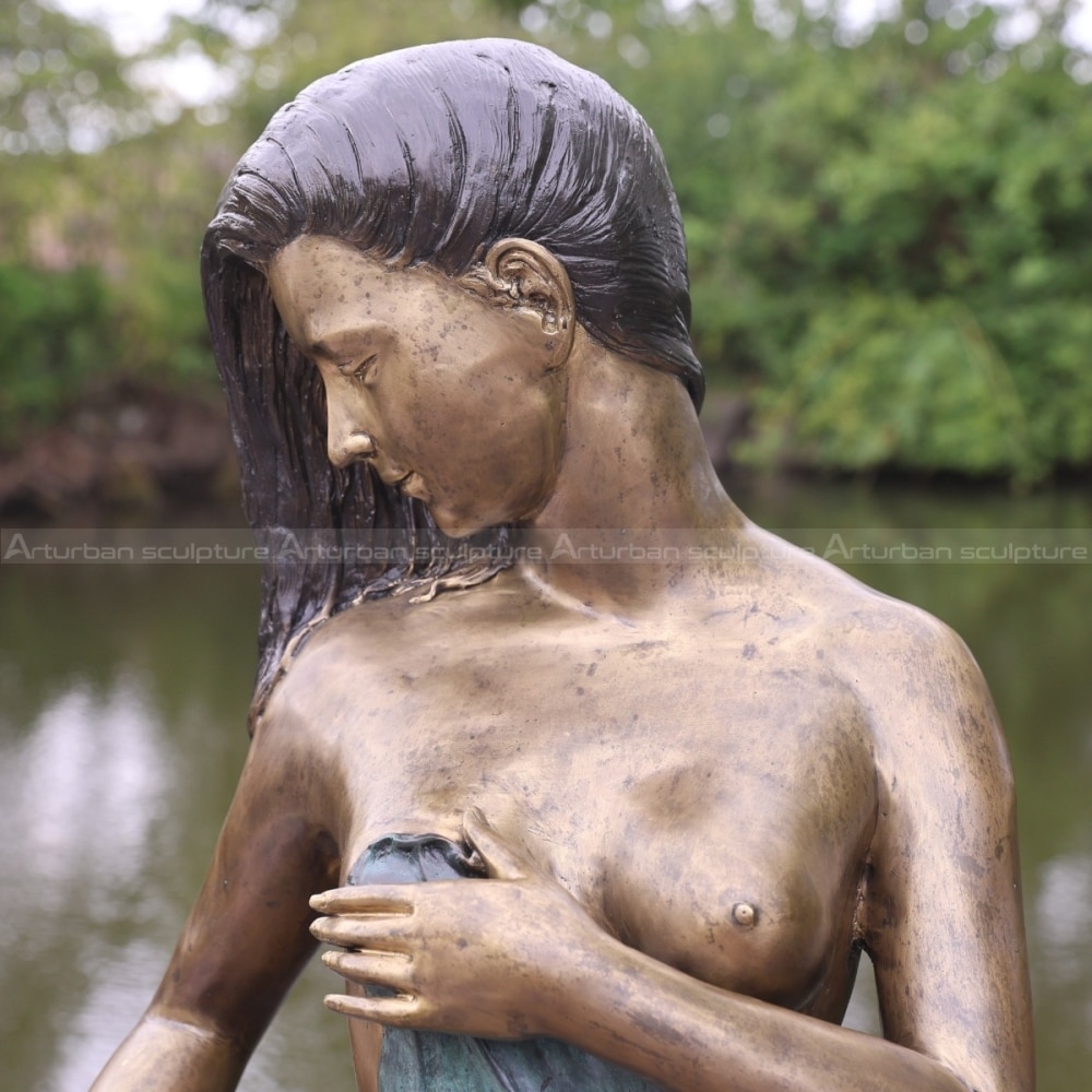 woman pouring water fountain