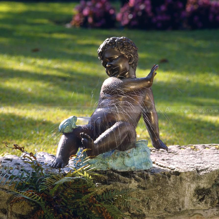 boy and frog water fountain