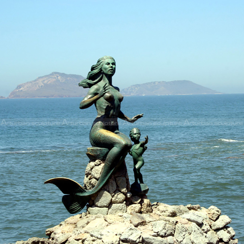 large bronze mermaid statue