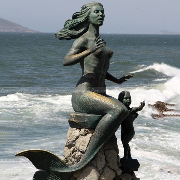 large bronze mermaid statue