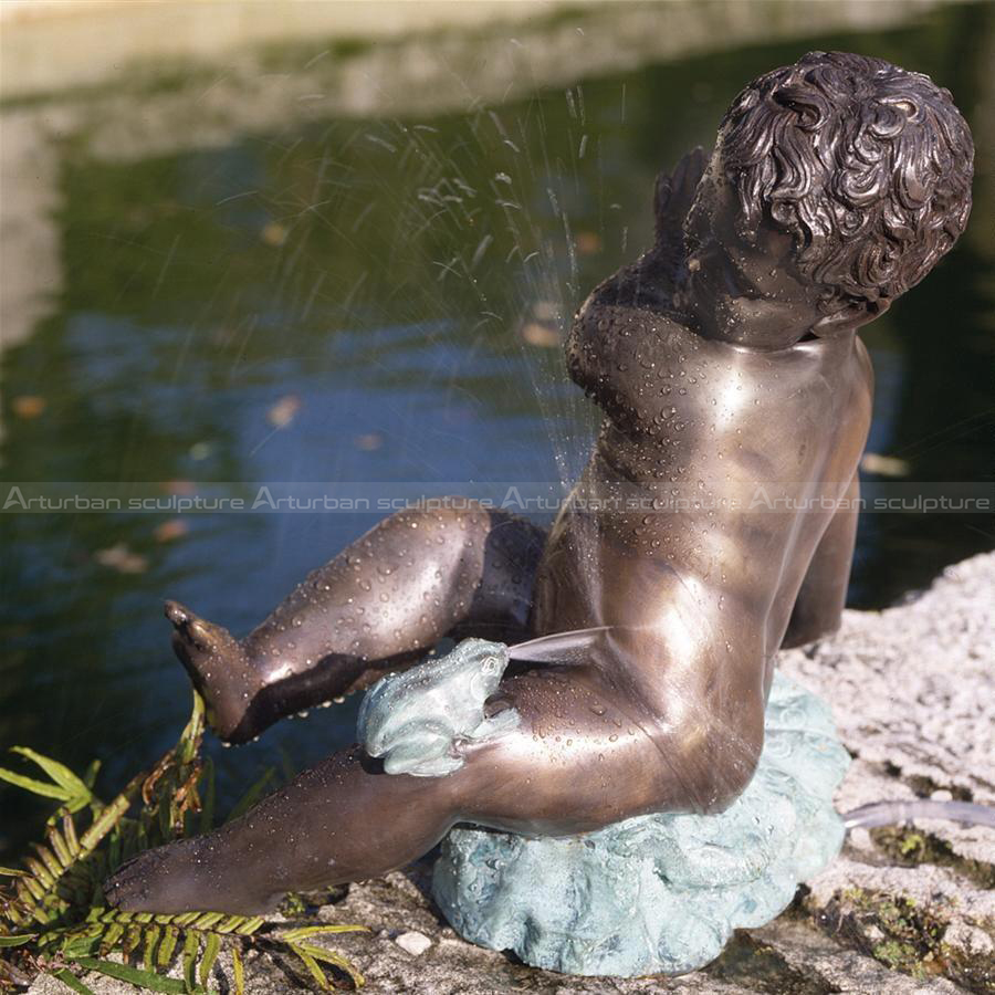 boy and frog water fountain