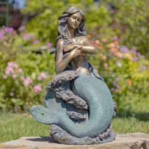 mermaid on a rock sculpture