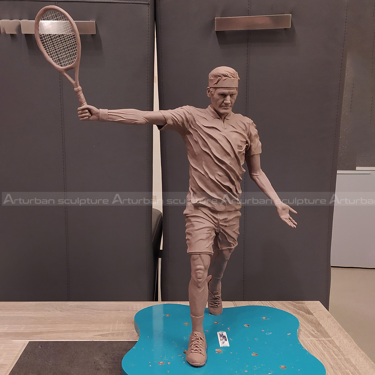 tennis player figurine