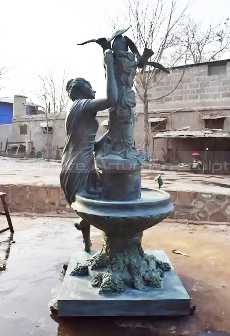 female sculpture fountain