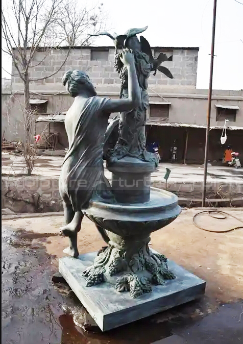 female sculpture fountain