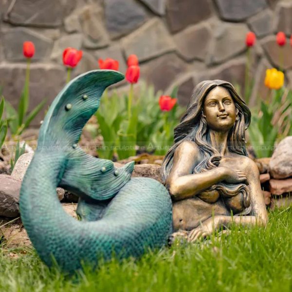 metal mermaid sculpture