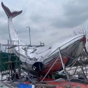 stainless steel whale sculpture