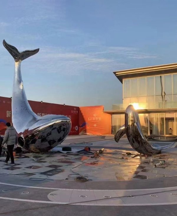 stainless steel whale sculpture