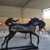 black running horse statue