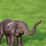 Escultura de elefante de bronce antiguo