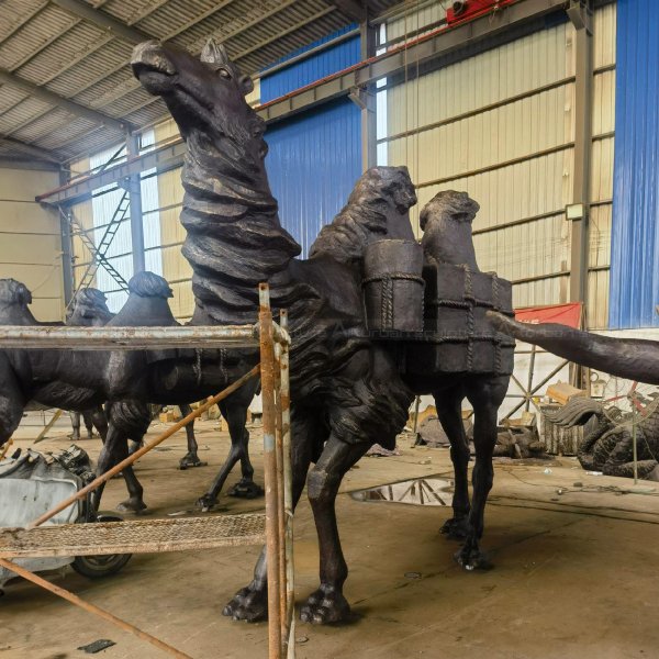 Bronze Camel Statue carrying a saddle with loaded bags