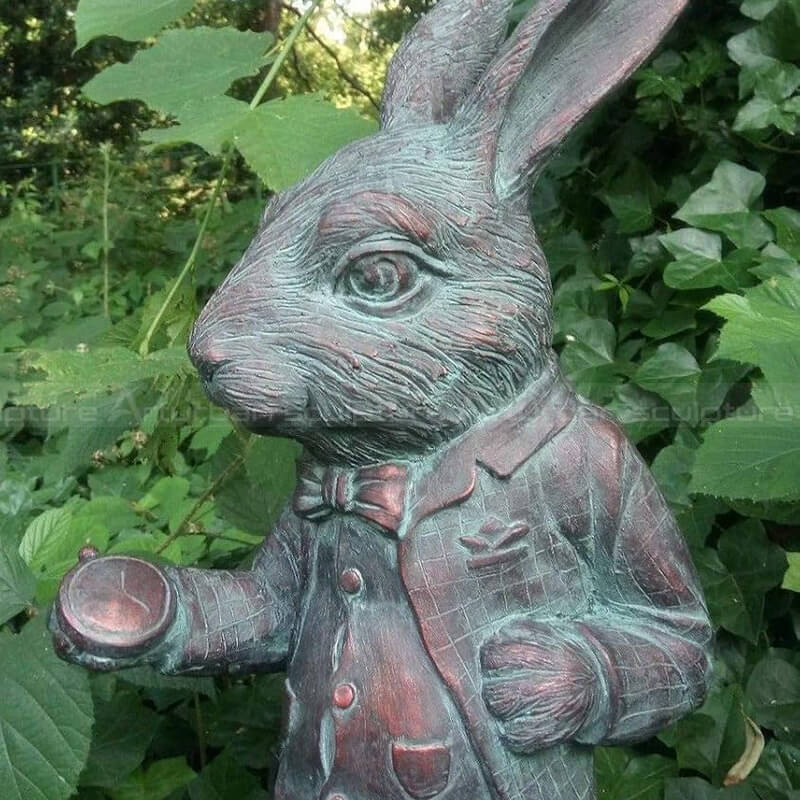 Close-up Alice Wonderland rabbit garden statue
