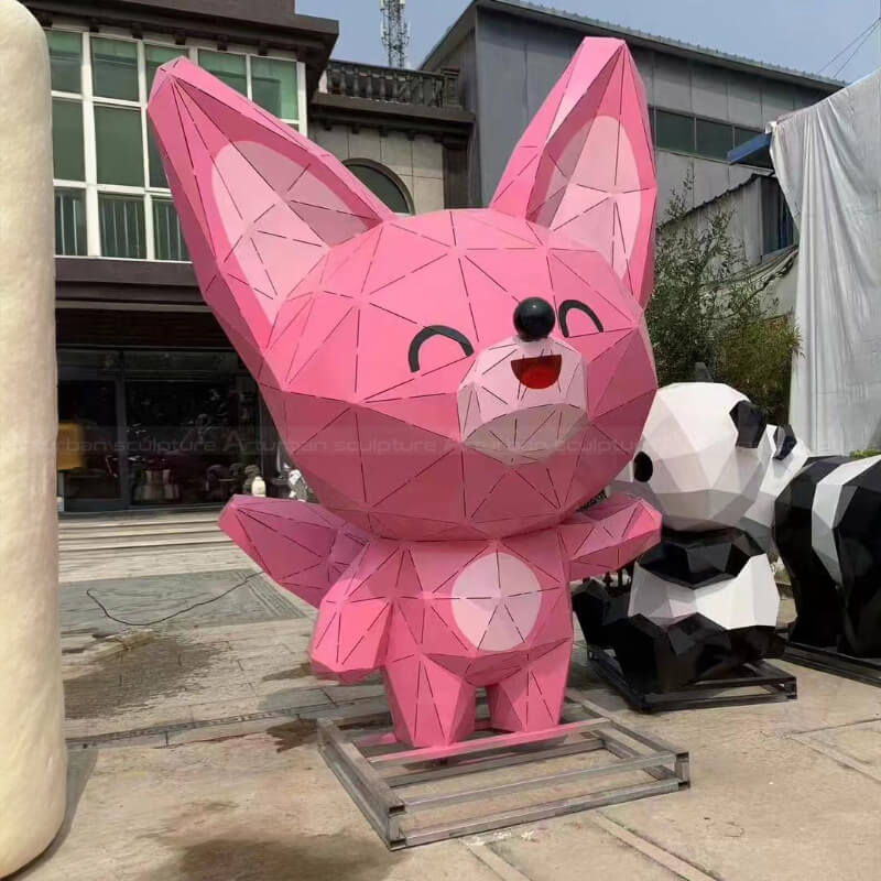 cartoon pink geometric fox statue