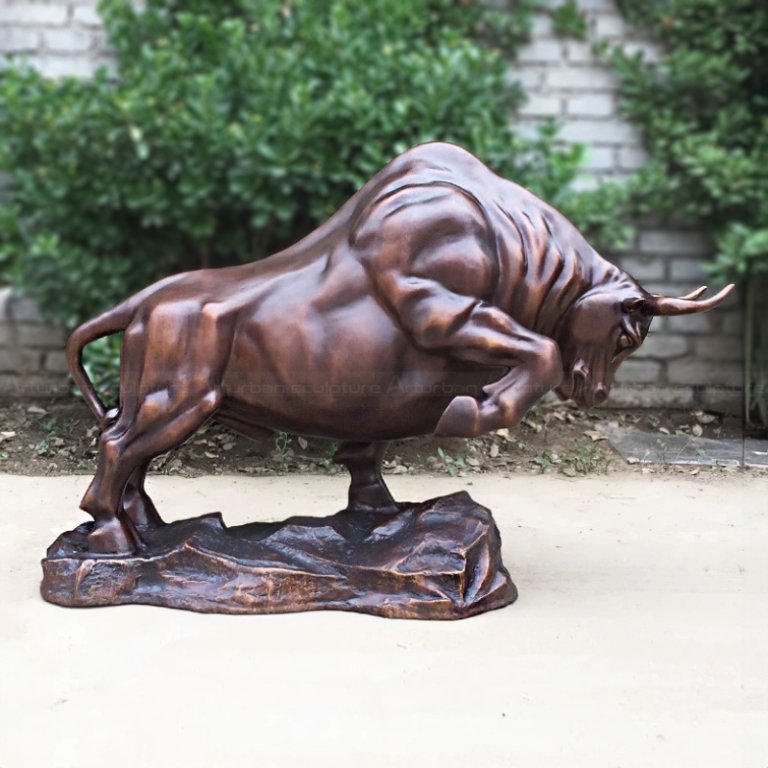 Angry muscular charging Bull bronze Statue