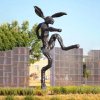 Barry Flanagan Hare Sculptures in a playful and energetic pose