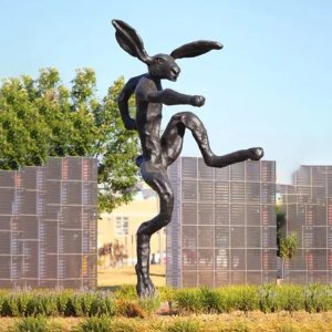 Barry Flanagan Hare Sculptures in a playful and energetic pose