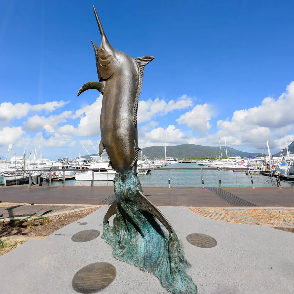 Bronze Marlin leaping out of the water Statue