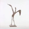 Contemporary Bird Figurine of a abstract flamingo by Pierre Yermia, featuring elongated legs and exaggerated wings raised in a poised, upward motion