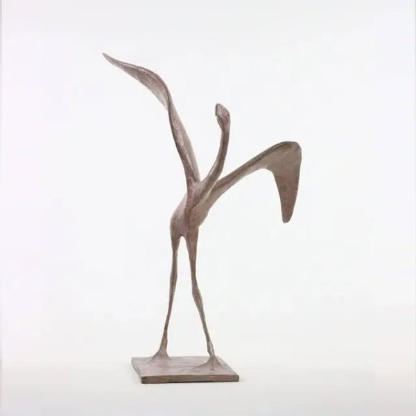 Contemporary Bird Figurine of a abstract flamingo by Pierre Yermia, featuring elongated legs and exaggerated wings raised in a poised, upward motion