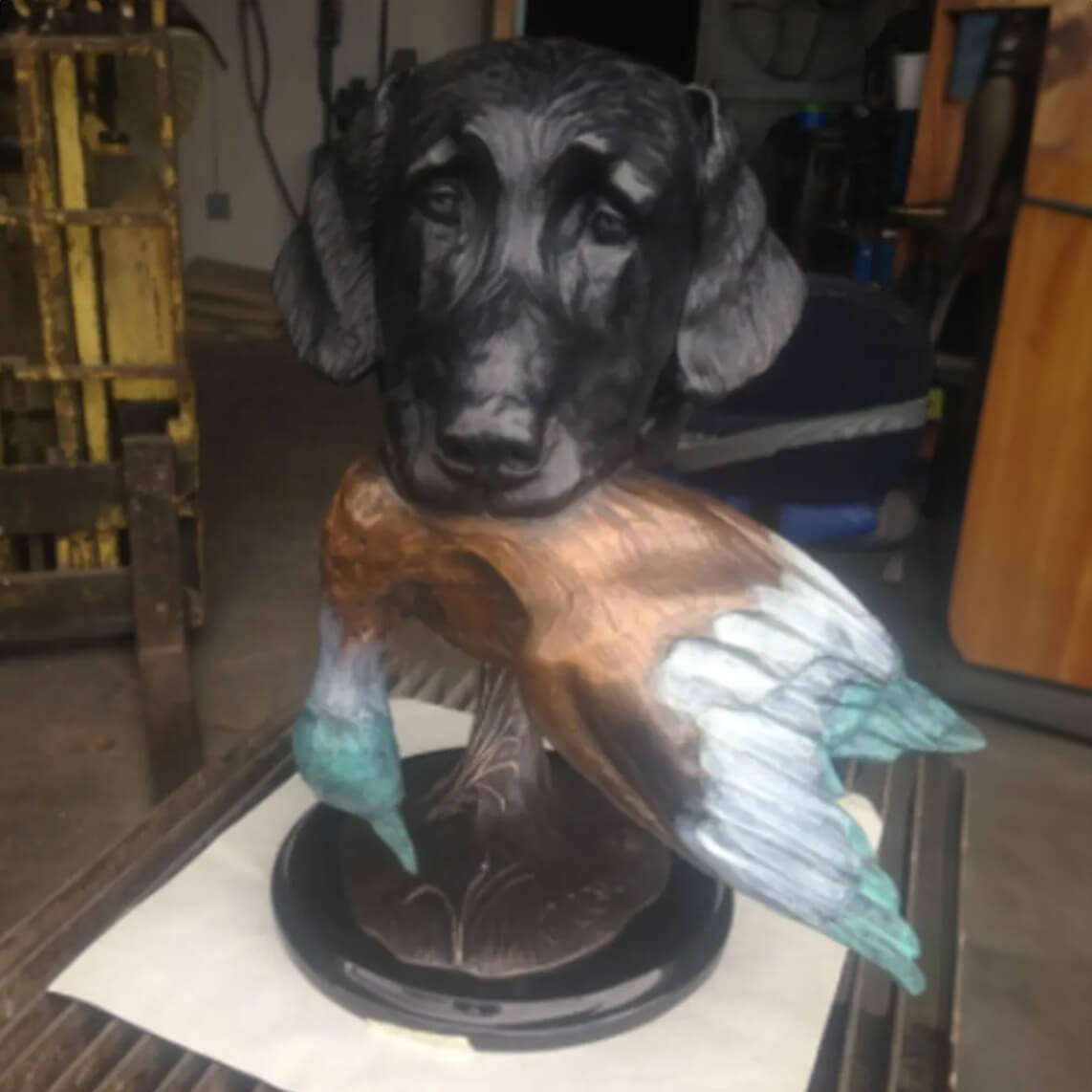 Labrador Retriever holding a wild duck in its mouth bronze Garden Statue