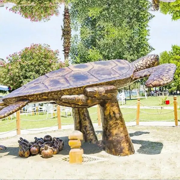 Large Outdoor Sea Turtle bronze Statue showing a giant loggerhead sea turtle surrounded by turtle eggs and newly hatched baby turtles