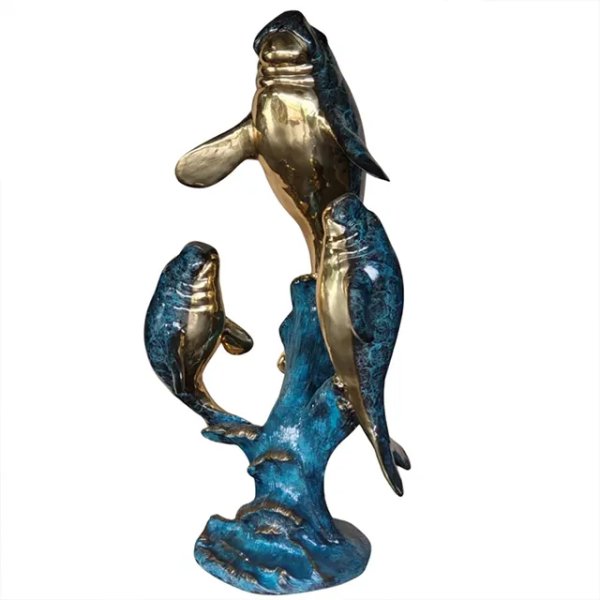 Manatee Sculpture for Sale showing the larger one at the top while the two smaller ones below