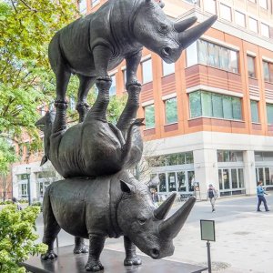 The Last Three Statue by Gillie and Marc Schattner featuring three stacked rhinoceroses, representing the last Northern White Rhinos