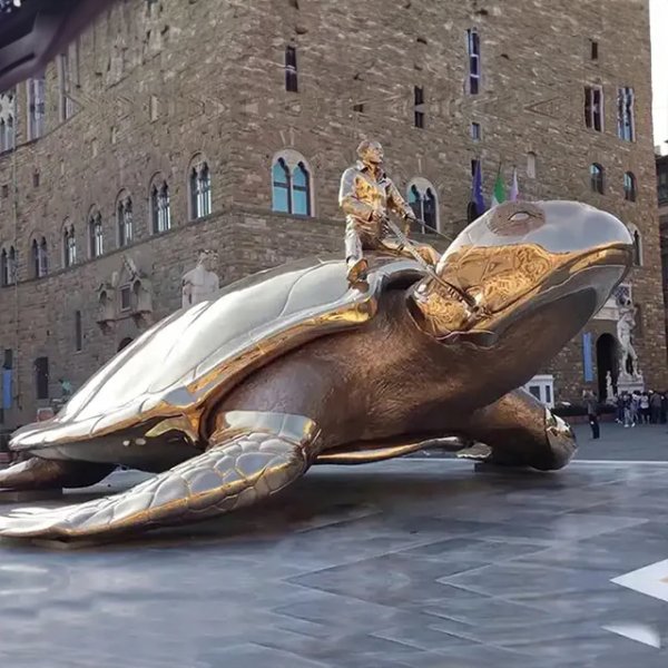 bronze Giant Turtle Sculpture with a knight (self-portrait of Jan Fabre) sitting on its back