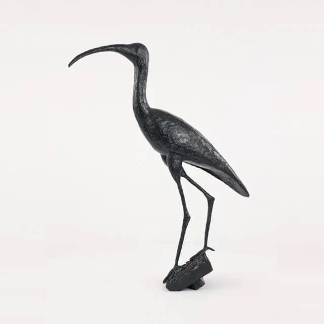 bronze Ibis Sculpture features its long beak and slender body