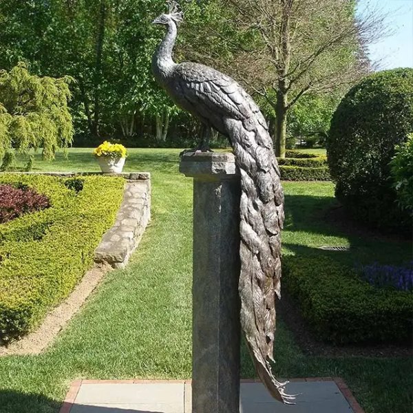 bronze Peacock Yard Ornament with copper patina