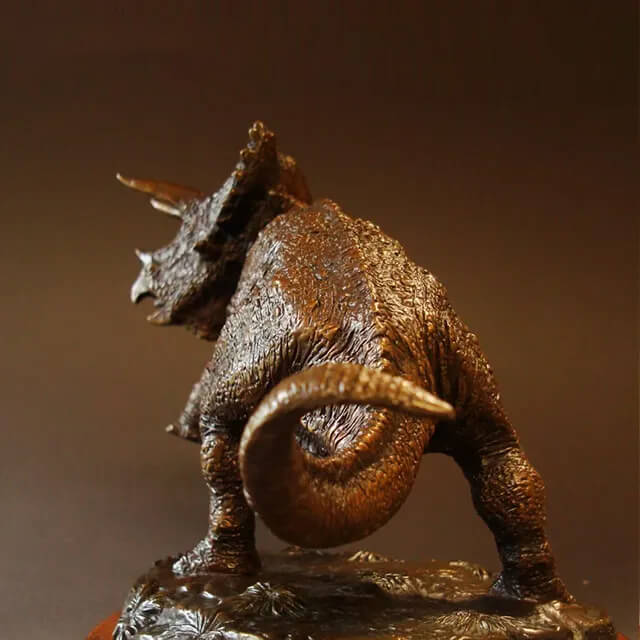 rear view of Triceratops Statue showing its powerful tail