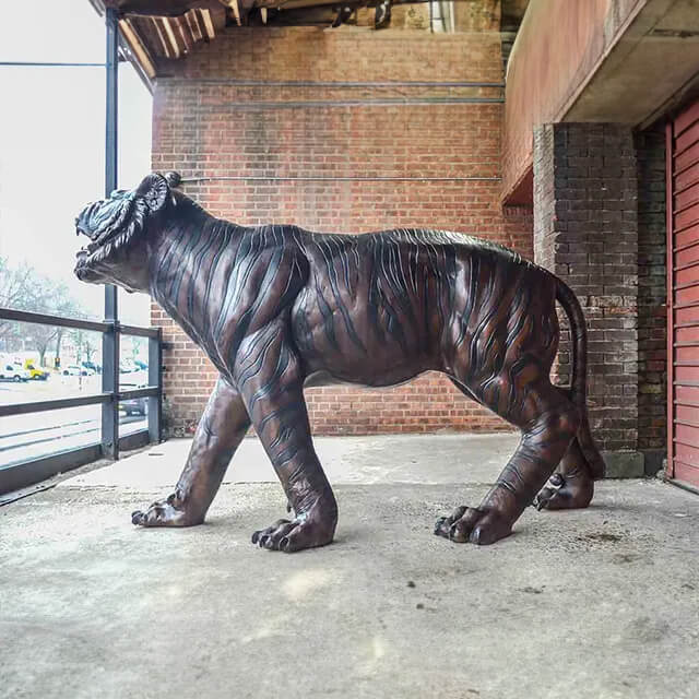 side view of bronze Bengal Tiger Figurine with muscular body
