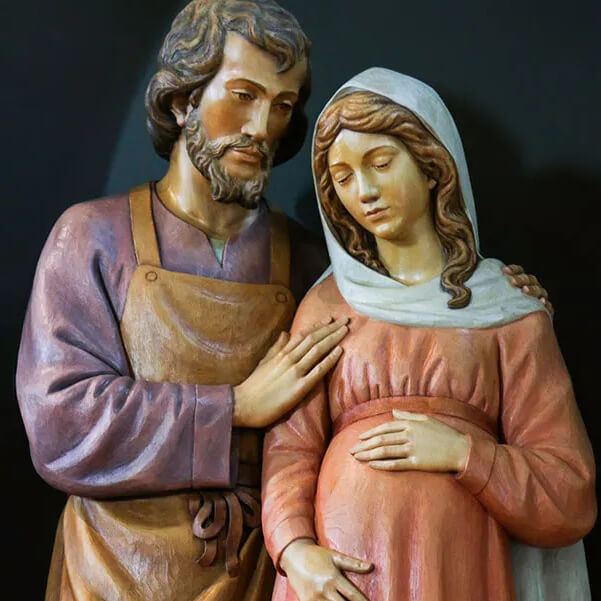 Statue of pregnant Mary with Joseph beside her