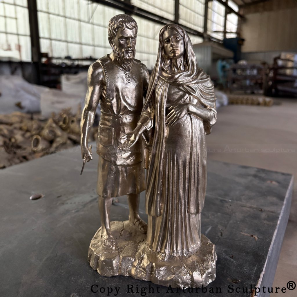 front view of mary and joseph sculpture after chasing