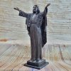 Bronze Statue of Jesus standing barefoot on a square base